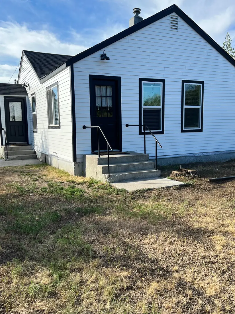 Completed whole-home exterior renovation with new siding and trim