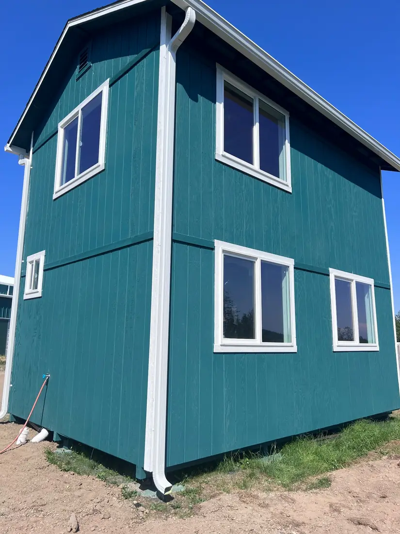 Two-story ADU with board-and-batten siding